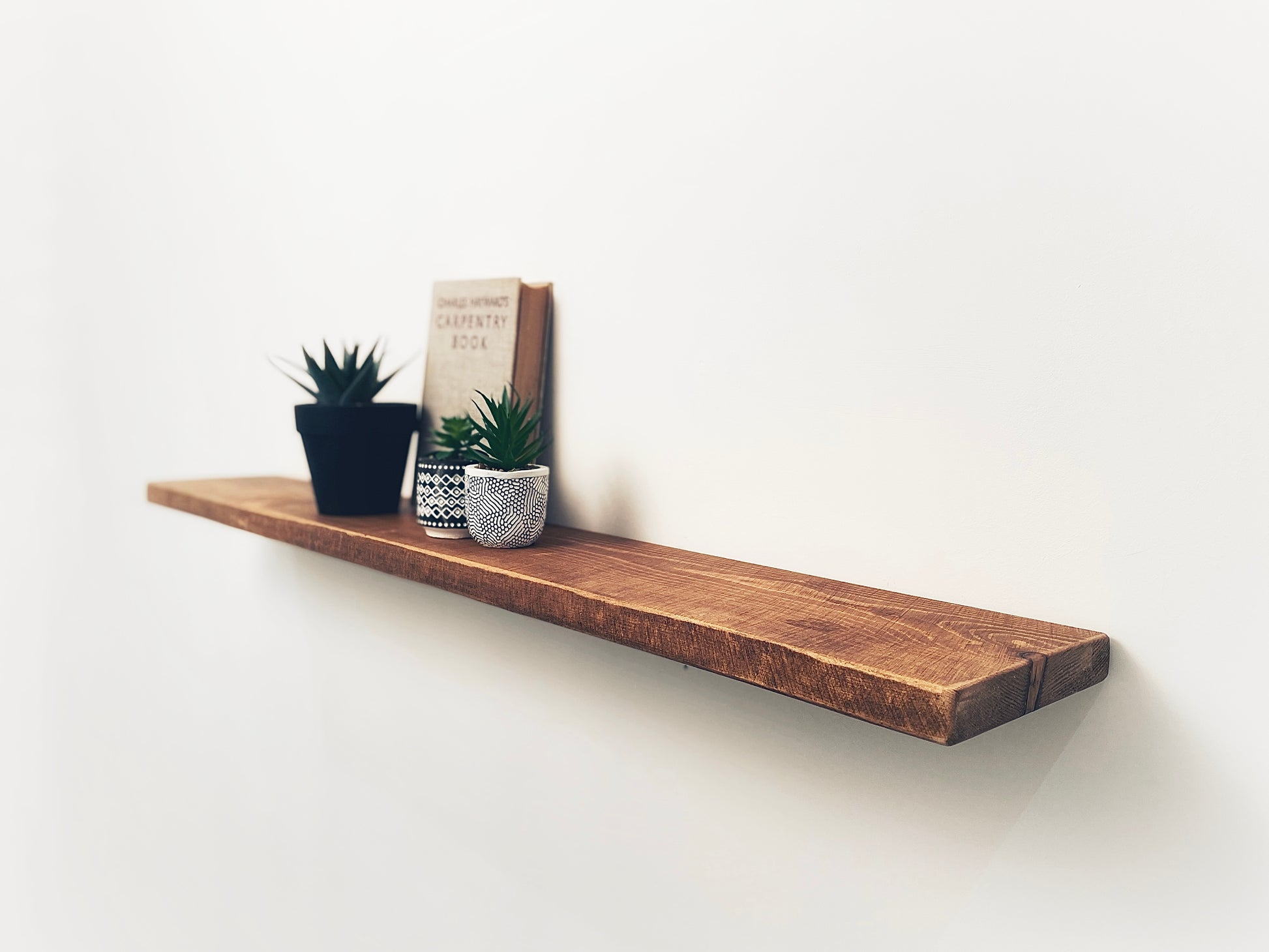 Floating rustic wooden shelf